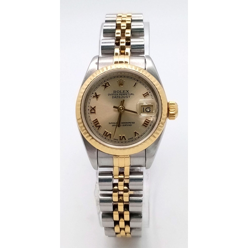 106 - A Rolex Oyster Perpetual Ladies Datejust Watch. Bi-metal (gold and steel) bracelet and case - 26mm. ... 