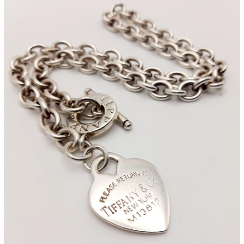 52 - A Classic Tiffany Sterling Silver Necklace with Hanging Heart Pendant. All the usual Tiffany marking... 