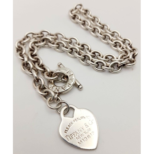 52 - A Classic Tiffany Sterling Silver Necklace with Hanging Heart Pendant. All the usual Tiffany marking... 