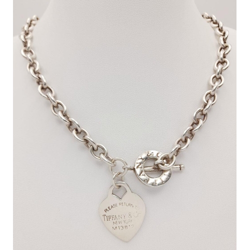 52 - A Classic Tiffany Sterling Silver Necklace with Hanging Heart Pendant. All the usual Tiffany marking... 