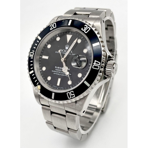 9 - An Early 1990s Rolex Submariner Automatic Gents Watch. Model 16610. Stainless steel bracelet and cas... 