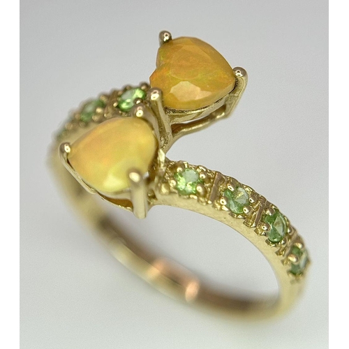 635 - A 9K Yellow Gold Stone Set Twist Ring, 1.8g total weight, size L 1/2.
ref: 1656I