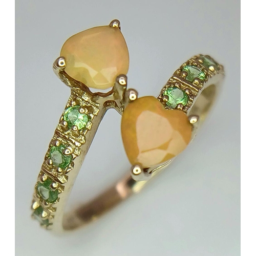 635 - A 9K Yellow Gold Stone Set Twist Ring, 1.8g total weight, size L 1/2.
ref: 1656I