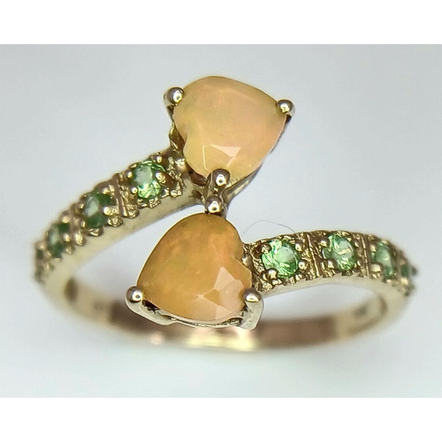 635 - A 9K Yellow Gold Stone Set Twist Ring, 1.8g total weight, size L 1/2.
ref: 1656I