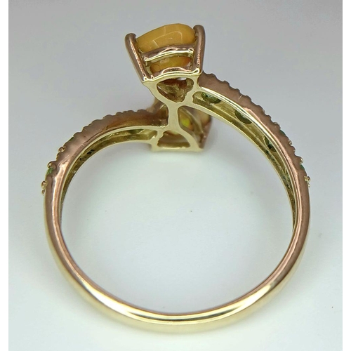 635 - A 9K Yellow Gold Stone Set Twist Ring, 1.8g total weight, size L 1/2.
ref: 1656I