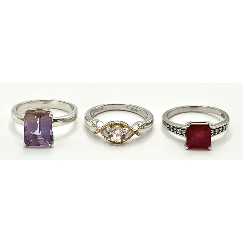 1226 - Three Sterling Silver Stone Set Rings - Ruby (N), Amethyst (N) and Pink Quartz (N).