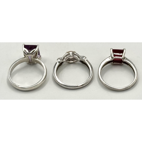 1226 - Three Sterling Silver Stone Set Rings - Ruby (N), Amethyst (N) and Pink Quartz (N).