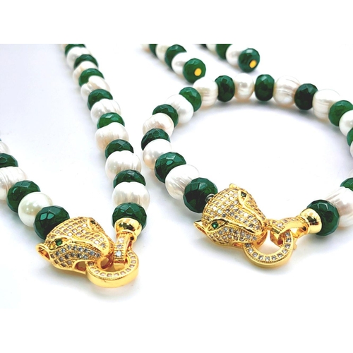 115 - A very glamorous green jade and natural cultured pearl necklace, bracelet and earrings set with gold... 