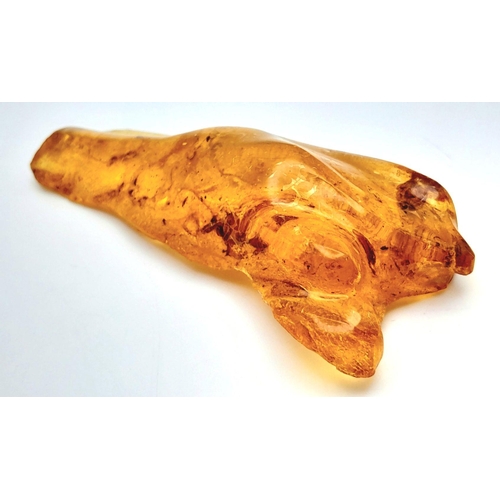 129 - A very collectable natural piece of amber with nine (yes, nine!) insect inclusions. Origin: Madagasc... 