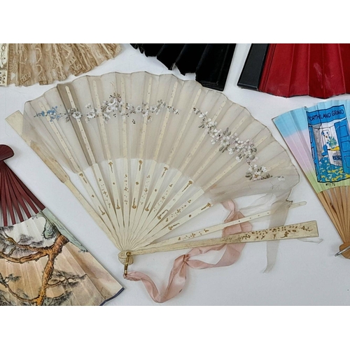 135 - A selection of 29 vintage/antique hand fans, various designs and sizes, both print and hand painted,... 