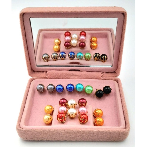 178 - A comprehensive collection of ten pairs of faux pearl stud earrings in a variety of fashionable colo... 