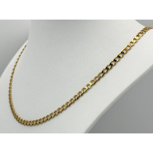 24 - A 9K Yellow Gold Flat Curb Link Chain. 44cm. 8g weight.