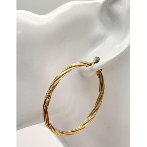 31 - A Pair of 9K Yellow Gold Large Creole Hoop Earrings. 5cm. 5g weight.