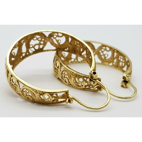 38 - A Pair of 9K Yellow Gold Hoop Earrings. Pierced decoration. 
25mm diameter. 4.6g total weight.