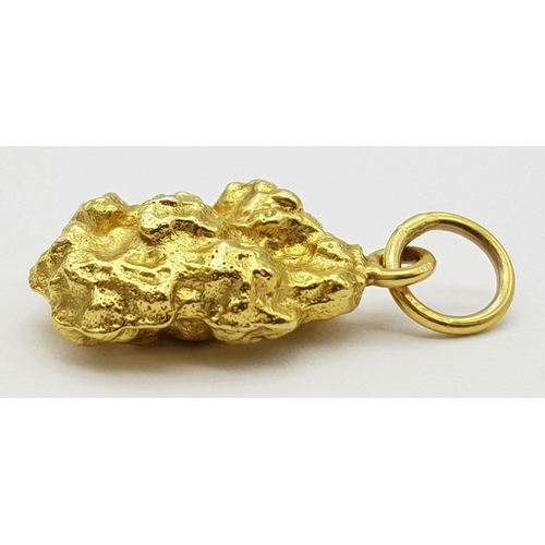 45 - An Australian Gold Nugget Pendant. Tests as at least 22K. 11.2g weight.