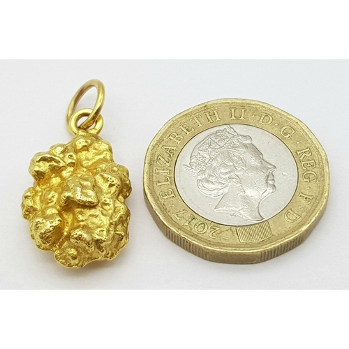 45 - An Australian Gold Nugget Pendant. Tests as at least 22K. 11.2g weight.