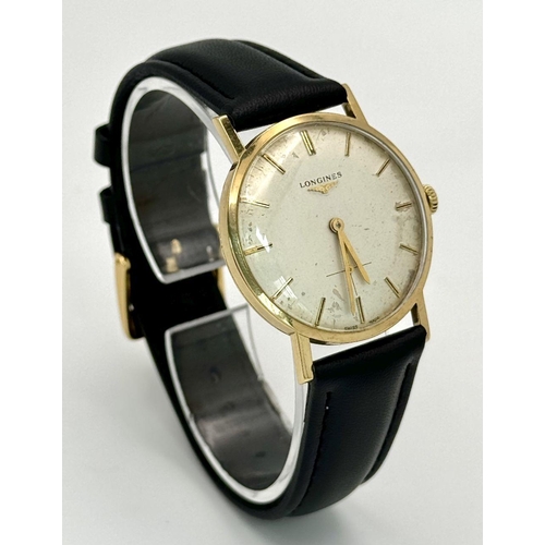 8 - A Vintage 9K Gold Cased Longine Gents Watch. New black leather strap. 9k gold case - 32mm. Recently ... 