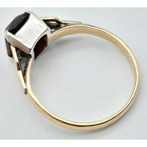 126 - An appealing 9 carat GOLD RING having a red  Emerald cut Carnelian coloured Gemstone set to top and ... 