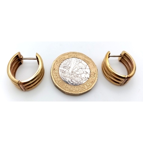 133 - An elegant pair of 9 CARAT GOLD EARRINGS. Triple hoop. Fully hallmarked. Presented in jewellers earr... 