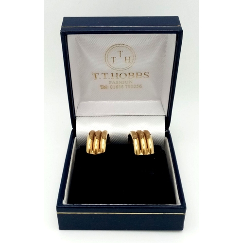 133 - An elegant pair of 9 CARAT GOLD EARRINGS. Triple hoop. Fully hallmarked. Presented in jewellers earr... 