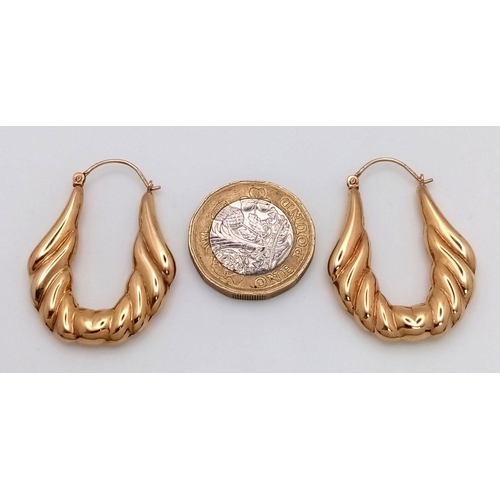 140 - Stunning pair of 9 carat GOLD CREOLE HOOP EARRINGS. 3.7 grams. 3.5 cm Drop. Please see pictures.