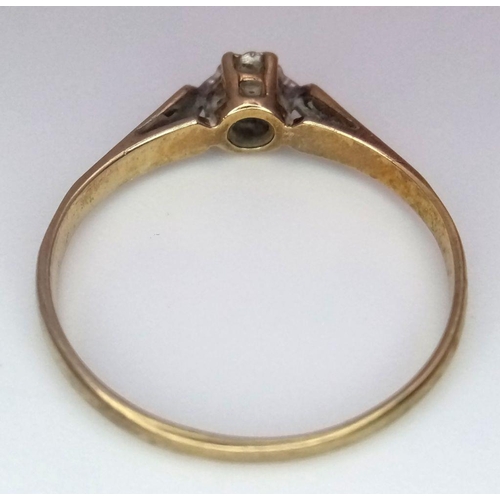 189 - An appealing subtle and dainty 9 carat GOLD and DIAMOND RING. Full UK hallmark. Complete with ring b... 