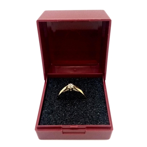 189 - An appealing subtle and dainty 9 carat GOLD and DIAMOND RING. Full UK hallmark. Complete with ring b... 