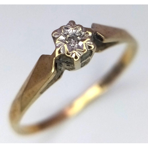 189 - An appealing subtle and dainty 9 carat GOLD and DIAMOND RING. Full UK hallmark. Complete with ring b... 