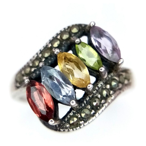 252 - Vintage SILVER MARCASITE RING. Set with various gemstones to include Tanzanite. Complete with jewell... 