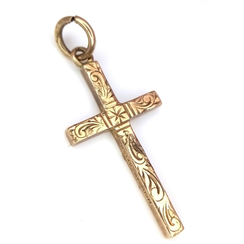 273 - Vintage dainty hallmarked 9 carat  GOLD CROSS. Beautifully decorated to top. 1.3 grams. 2.5 x 1.2 cm... 