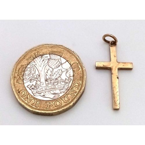 273 - Vintage dainty hallmarked 9 carat  GOLD CROSS. Beautifully decorated to top. 1.3 grams. 2.5 x 1.2 cm... 