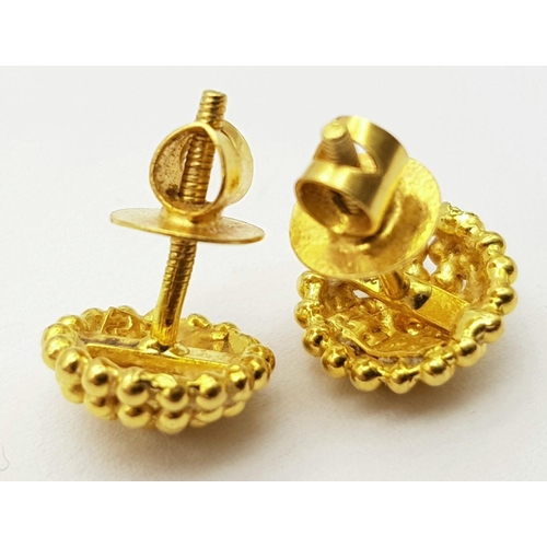 28 - Magnificent pair of 22 carat GOLD EARRINGS. Far Eastern origin ,complete with screw fitting GOLD BAC... 