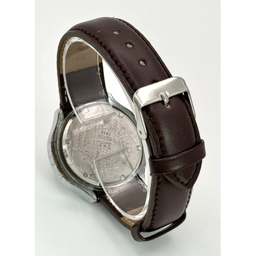 276 - A Vintage Sorna of Switzerland Jump Watch. Brown leather strap. Stainless steel case - 41mm. Brown d... 