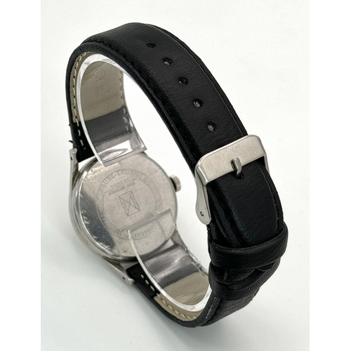 71 - A Vintage Favre Leuba Sea King Gents Watch. Black leather strap. Stainless steel case - 34mm. Manuel... 