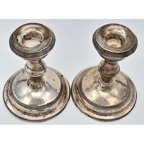 1779 - A Pair of Small Antique Sterling Silver Candlesticks. Birmingham hallmarks. Weighted bases. 354g tot... 