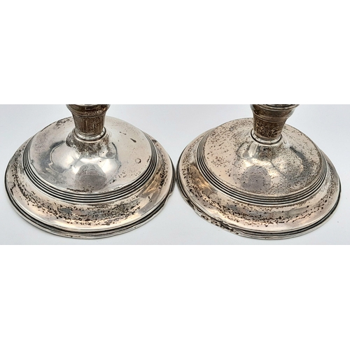 1779 - A Pair of Small Antique Sterling Silver Candlesticks. Birmingham hallmarks. Weighted bases. 354g tot... 