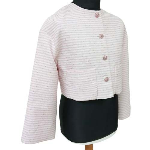 10 - A Chanel Pink and White Striped Cropped Jacket. Cotton, polyamide, and wool blend exterior with silv... 