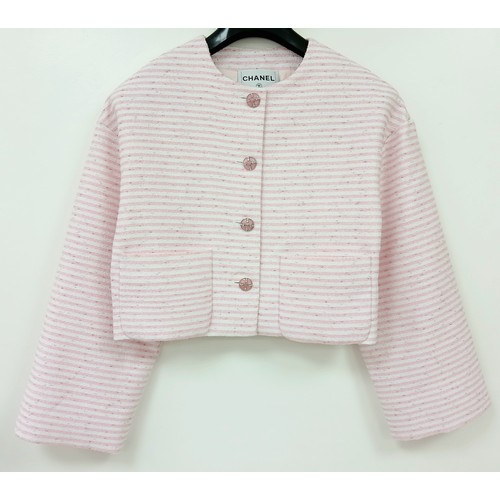 10 - A Chanel Pink and White Striped Cropped Jacket. Cotton, polyamide, and wool blend exterior with silv... 