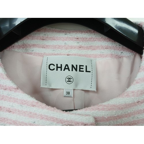 10 - A Chanel Pink and White Striped Cropped Jacket. Cotton, polyamide, and wool blend exterior with silv... 