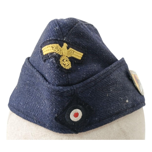 125 - WW2 German Kriegsmarine Side Cap with U-Boat Flotilla Pin.