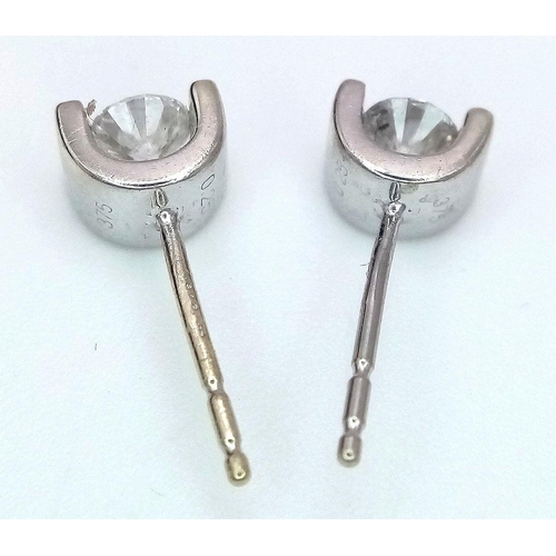 131 - A 9K WHITE GOLD DIAMOND STUD EARRINGS. 
 0.50CT 1.7G , NEED BUTTERFLY BACKS.

ref: SC 1060