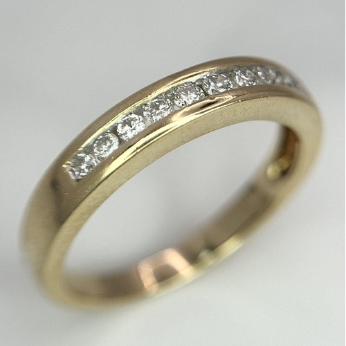 200 - A 14K YELLOW GOLD DIAMOND BAND RING 0.25CT 3.3G TOTAL WEIGHT, SIZE O.

ref: SC 1070