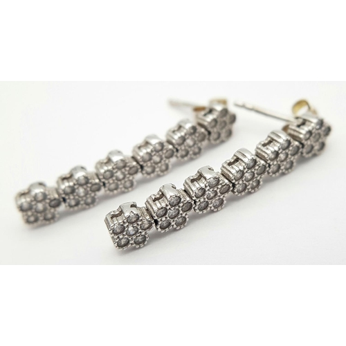 208 - A 14K WHITE GOLD STONE SET DROP EARRINGS 3.1G TOTAL WEIGHT, 2.5CM DROP.

ref: CHIN 1001