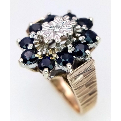 243 - A 9K YELLOW GOLD DIAMOND & SAPPHIRE VINTAGE RING, IN THE FLORAL DESIGN. 5G SIZE I 1/2.

ref: SC 1003