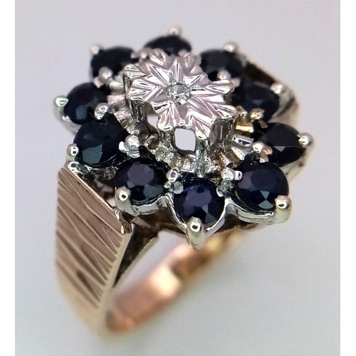 243 - A 9K YELLOW GOLD DIAMOND & SAPPHIRE VINTAGE RING, IN THE FLORAL DESIGN. 5G SIZE I 1/2.

ref: SC 1003