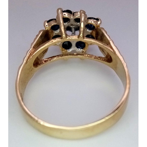 250 - A 9K YELLOW GOLD DIAMOND & SAPPHIRE VINTAGE CLUSTER RING 3.5G SIZE P.

ref: SC 1001