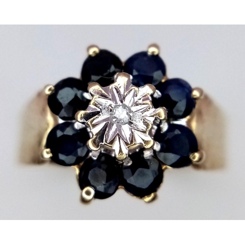 250 - A 9K YELLOW GOLD DIAMOND & SAPPHIRE VINTAGE CLUSTER RING 3.5G SIZE P.

ref: SC 1001