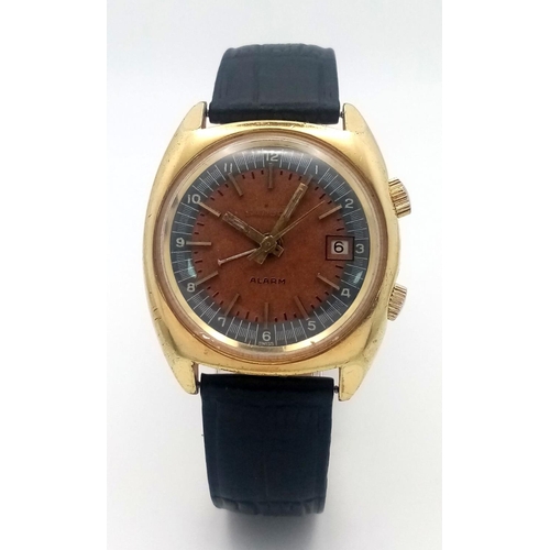 254 - A Rare Vintage Sandoz Alarm Gents Watch. Black leather strap. Gilded case - 35mm. Brown dial with da... 