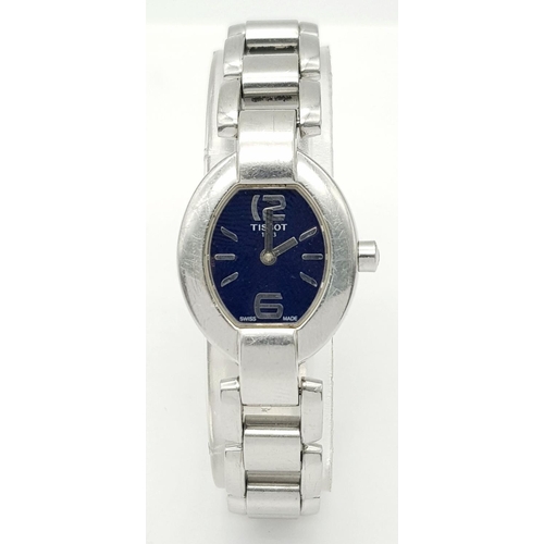 267 - A Vintage Tissot Ladies Quartz Watch. Stainless steel bracelet and case - 20mm. Blue dial. In workin... 