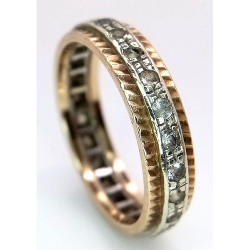 269 - A 9K GOLD STONE SET FULL ETERNITY RING .   3.2gms    size N